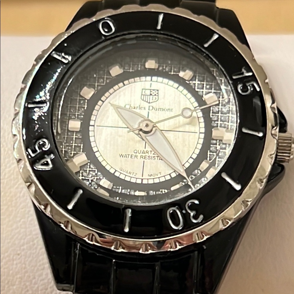 Lady’s Black and Silver Watch